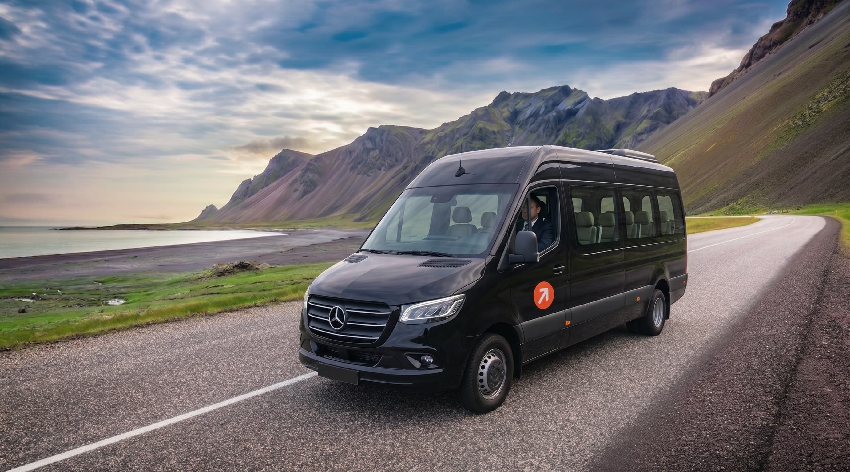 Reykjavik Express Mercedes Sprinter minibus on an Icelandic road